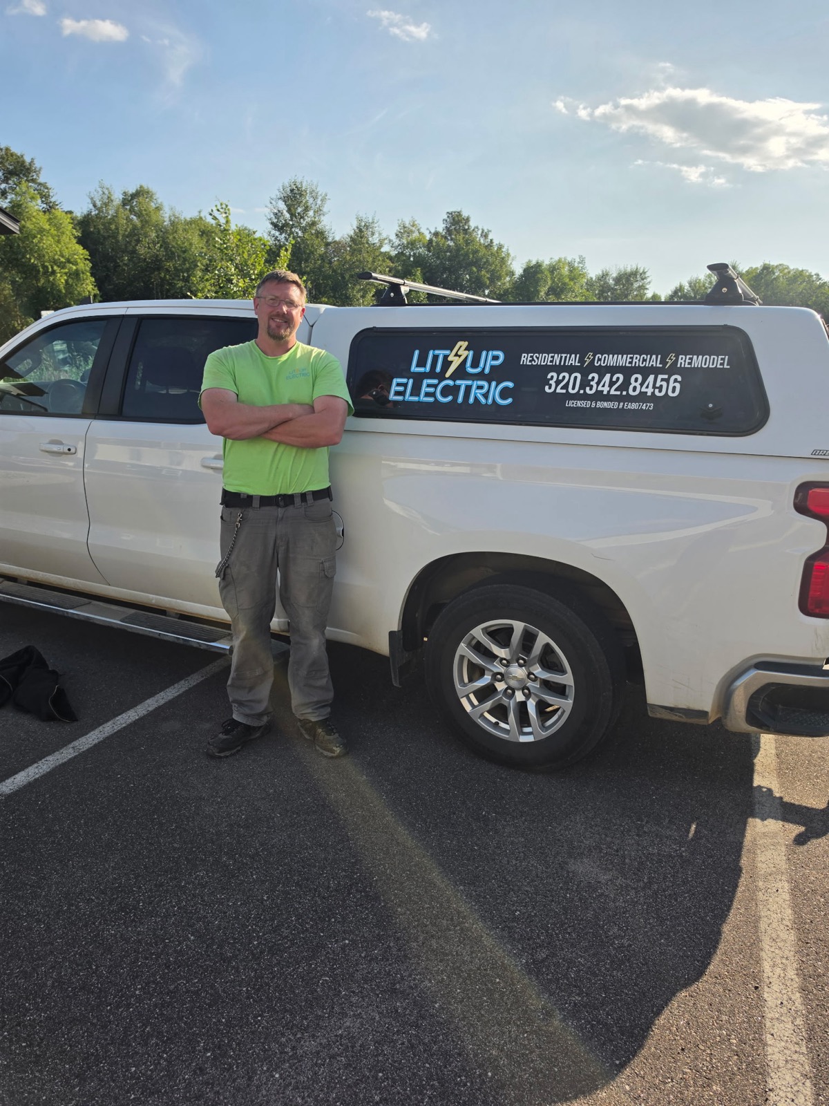 Terry Senchez, owner of Lit Up Electric, in front of his service truck